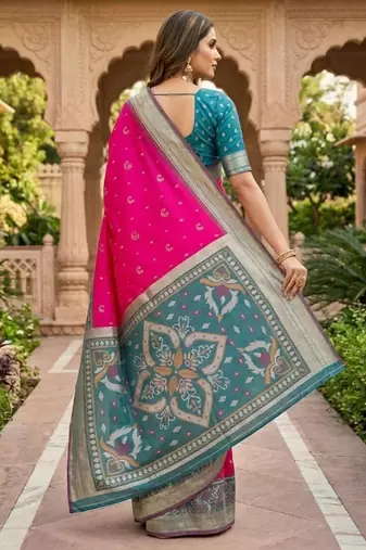 Rani pink color pochampally silk blend ikkat pattern zari woven border sarees