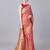 Peach color silk blend zari woven work saree