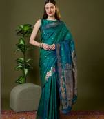Sea green color silk blend zari woven work saree