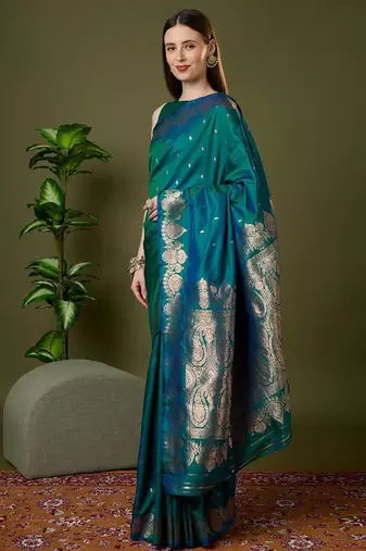 Sea green color silk blend zari woven work saree
