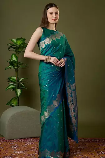 Sea green color silk blend zari woven work saree