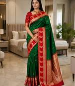 Dark green color silk blend zari woven work saree