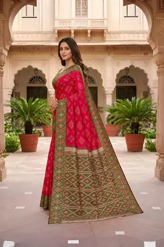 Rani pink color silk blend ikkat pattern woven work sarees