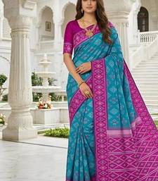 Sky blue color silk blend ikkat pattern woven work sarees