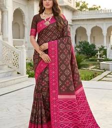 Brown color silk blend ikkat pattern woven work sarees