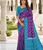 Purple color silk blend ikkat pattern woven work sarees