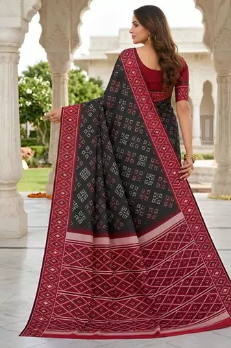 Black color silk blend ikkat pattern woven work sarees