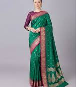 Green color silk blend zaro woven work sarees
