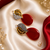 American Diamond Leaf Design Red Glass Stone Earrings
