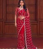 Red designer net saree with beads, sequins & pearl embroidery