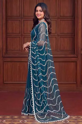 Teal designer net saree with beads, sequins & pearl embroidery