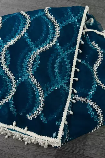Teal designer net saree with beads, sequins & pearl embroidery