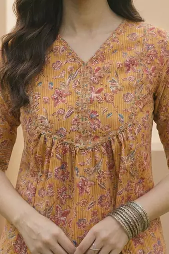 yellow floral print top