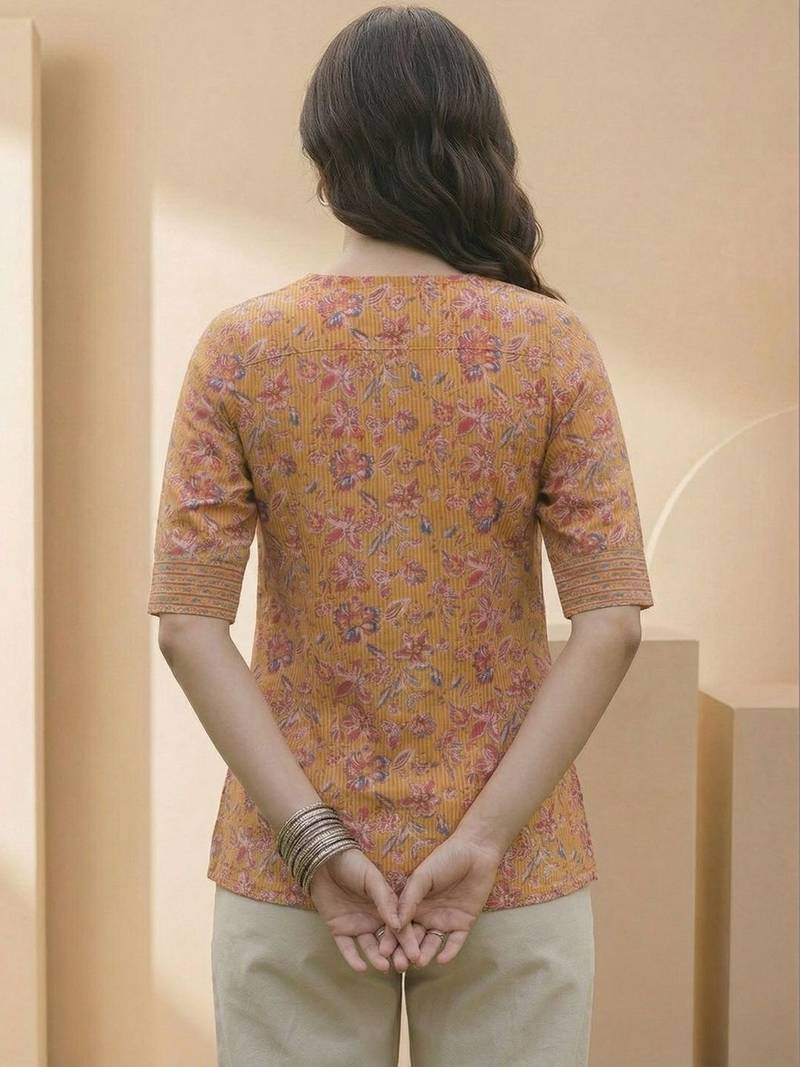 yellow floral print top