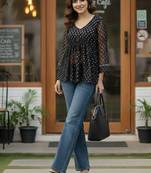 black geometric print top
