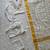 White floral embroidered cotton kurti pant set with yellow border dupatta
