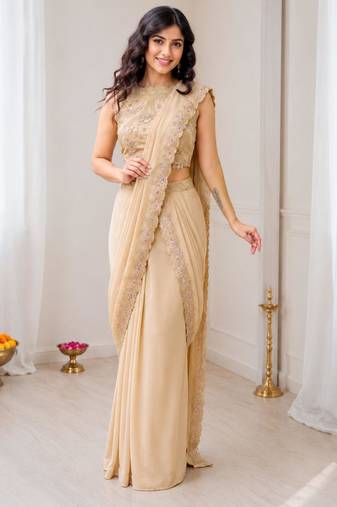 Cream georgette embroidered saree with sequins work