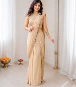 Cream georgette embroidered saree with sequins work