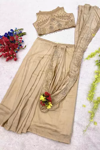 Cream georgette embroidered saree with sequins work