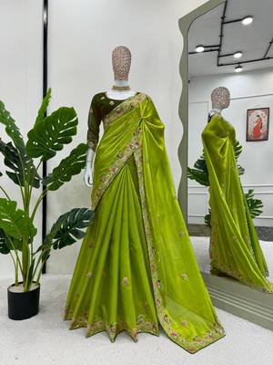 Green silk blend embroidered saree with sequins work 3