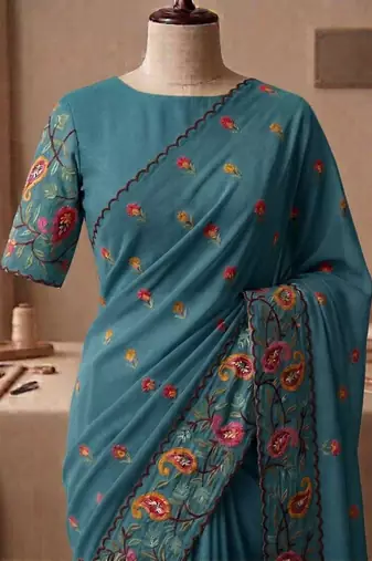 Teal georgette embroidered saree with thread work