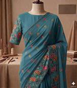 Teal georgette embroidered saree with thread work