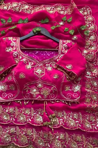 Rani pink satin embroidered saree with sequins work