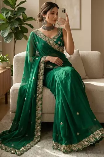 Green satin embroidered saree with sequins work