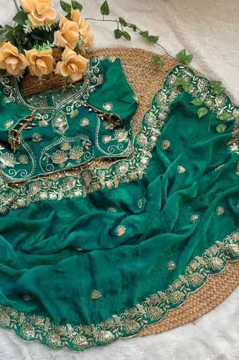 Green satin embroidered saree with sequins work
