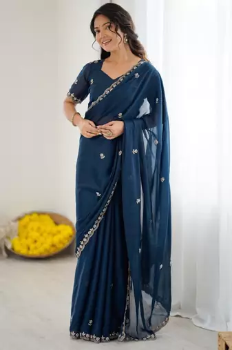 Blue georgette embroidered saree with sequins work