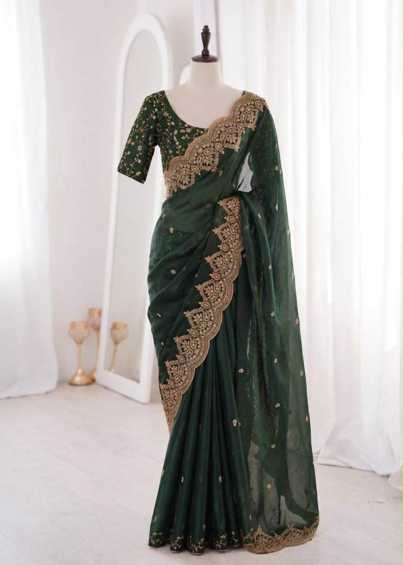 Green satin embroidered saree with sequins work