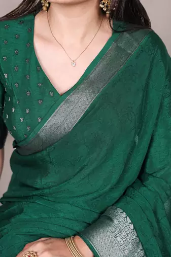 Green art silk woven saree with zari work