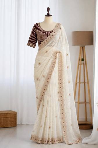 Off white organza embroidered saree with sequins work