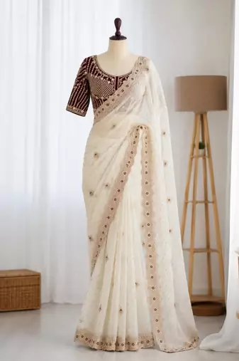 Off white organza embroidered saree with sequins work