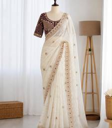 Off white organza embroidered saree with sequins work