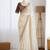 Off white organza embroidered saree with sequins work
