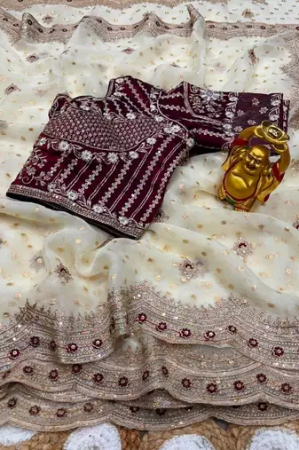 Off white organza embroidered saree with sequins work