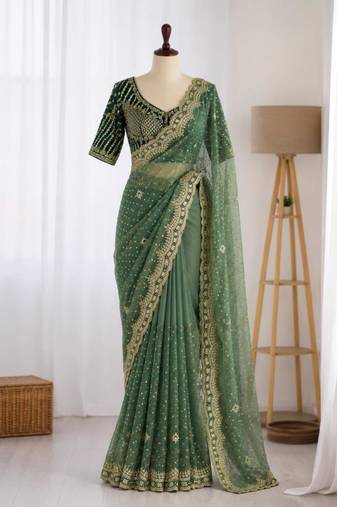 Green organza embroidered saree with sequins work