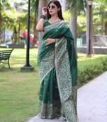 Green art silk woven saree with zari work