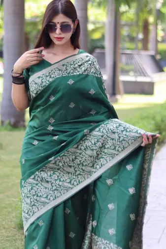 Green art silk woven saree with zari work