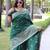 Green art silk woven saree with zari work