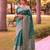 Green art silk woven saree with zari work