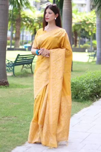 Yellow art silk woven saree with zari work