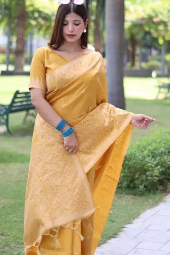Yellow art silk woven saree with zari work