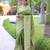 Green art silk woven saree with zari work
