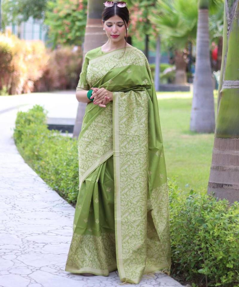 Green art silk woven saree with zari work