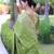 Green art silk woven saree with zari work