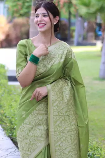 Green art silk woven saree with zari work