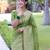 Green art silk woven saree with zari work