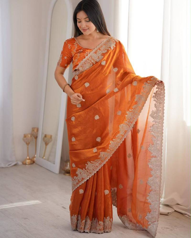 Orange silk blend embroidered saree with thread work